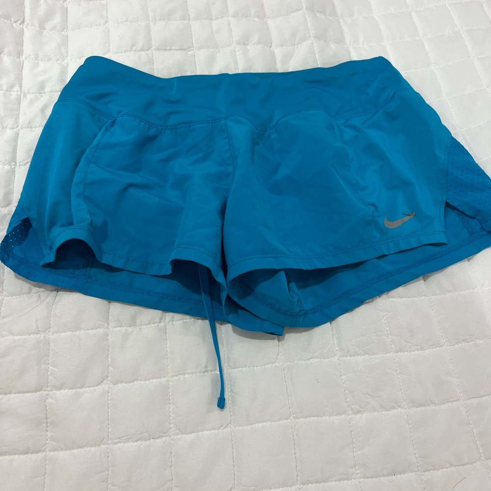 Blue Nike shorts